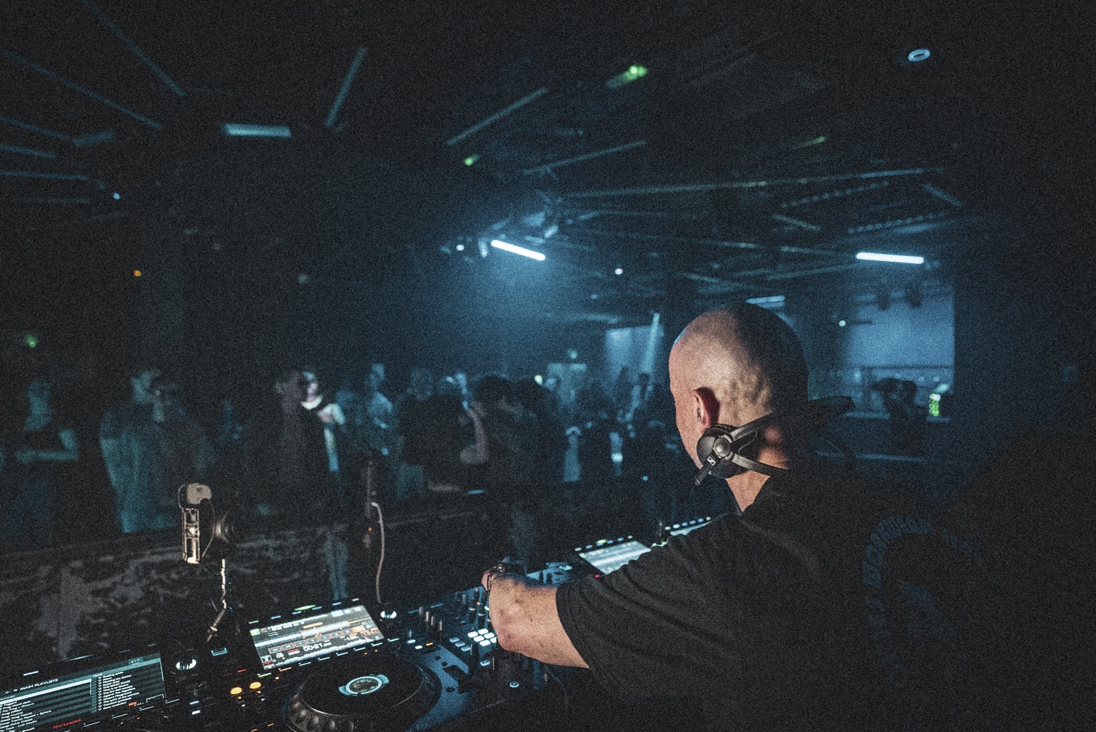 MYSTRA live performance seen from behind the DJ booth
