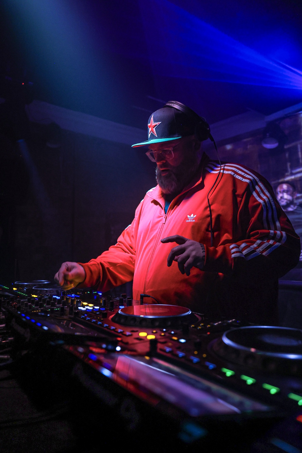 MYSTRA DJ under club lights